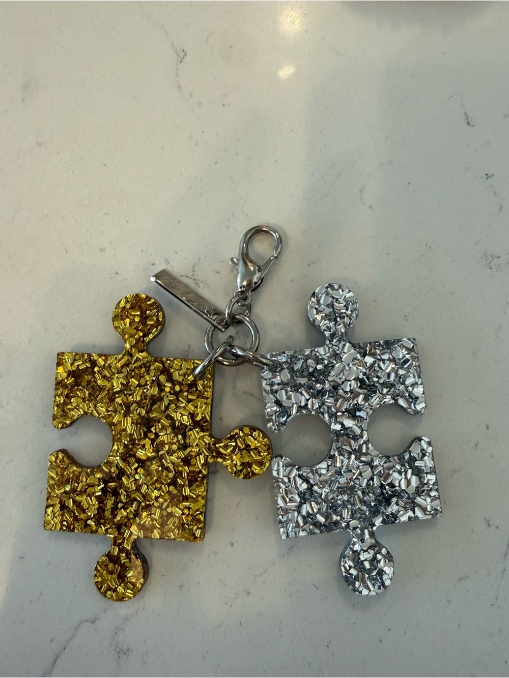 Edie Parker Metallic Gold & Silver Puzzle Piece Keychain - Picture 2 of 3